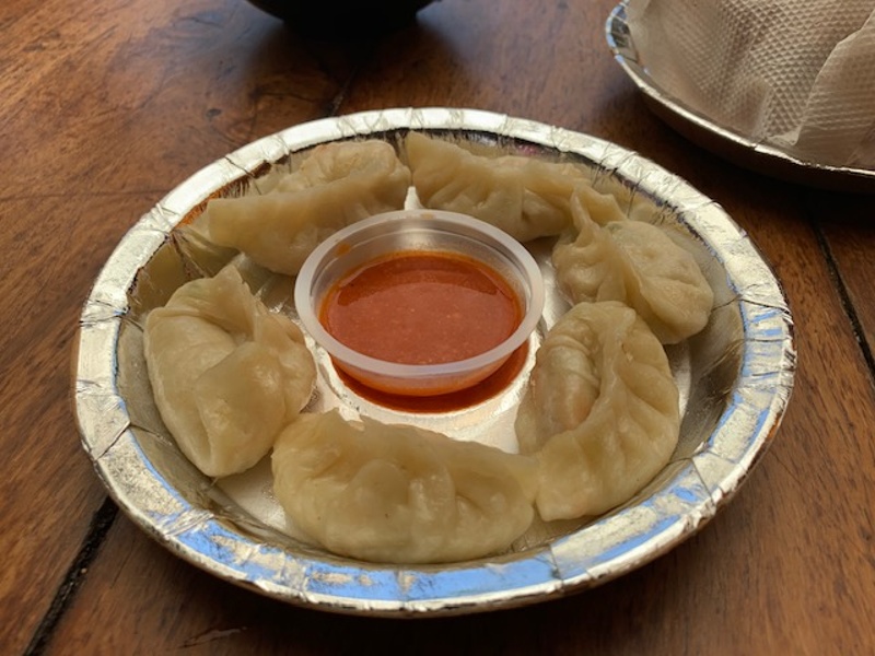 Eating momos - best places to eat in Mussoorie